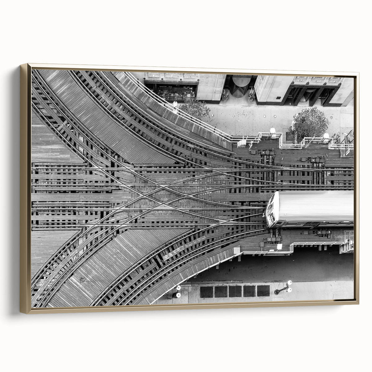 Framed canvas featuring a vintage-style landscape painting of the Chicago skyline in black and gold tones.