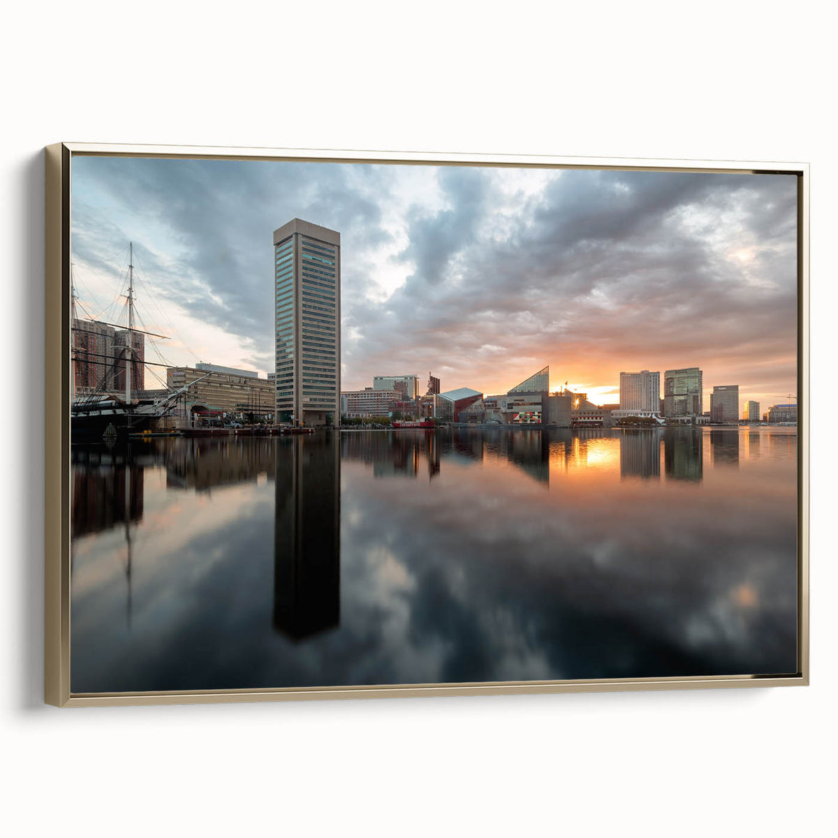Framed canvas wall art depicting a vintage-style Baltimore landscape in black and gold tones, ideal for bedroom decor.