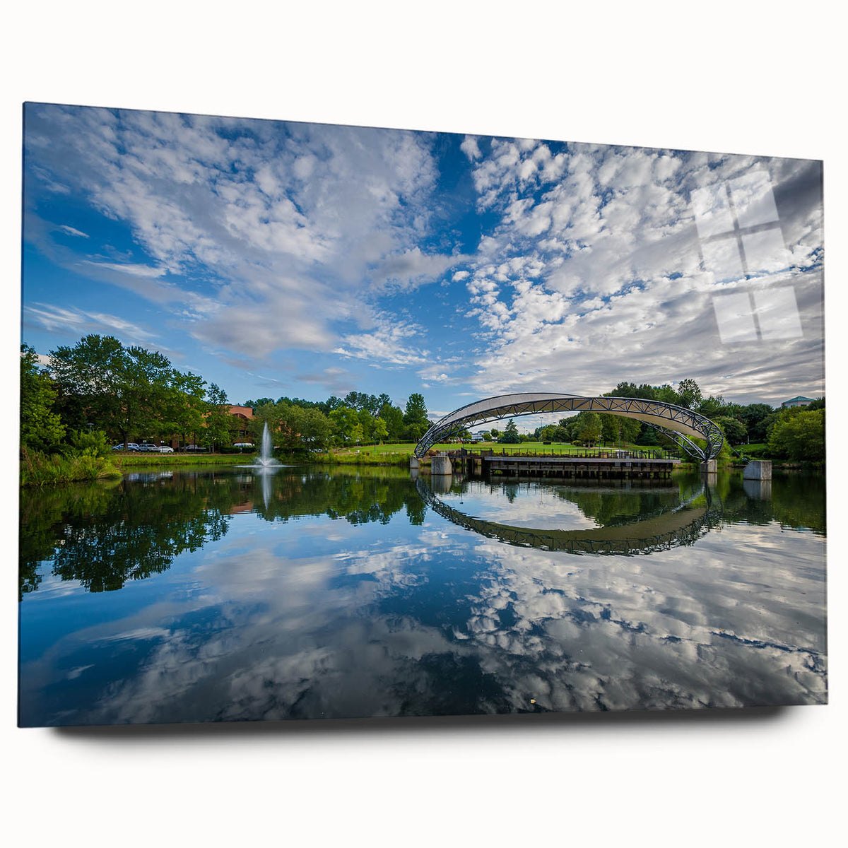 Acrylic print of a large abstract depiction of the Charlotte skyline in muted blue and gray tones.