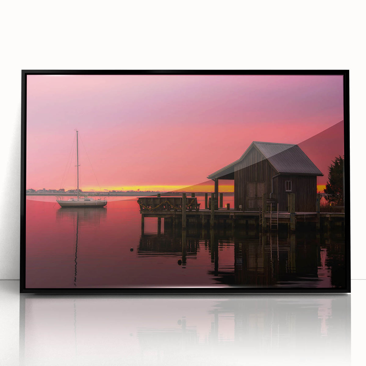 Large abstract wall art depicting the Outer Banks, North Carolina, in muted blue and gray tones on a framed acrylic print.