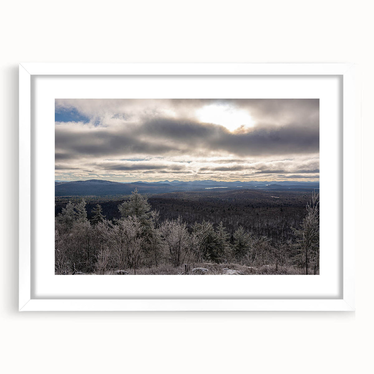 Abstract art print of Adirondack scenery in muted earth tones on a framed white canvas, ideal for dining room decor.