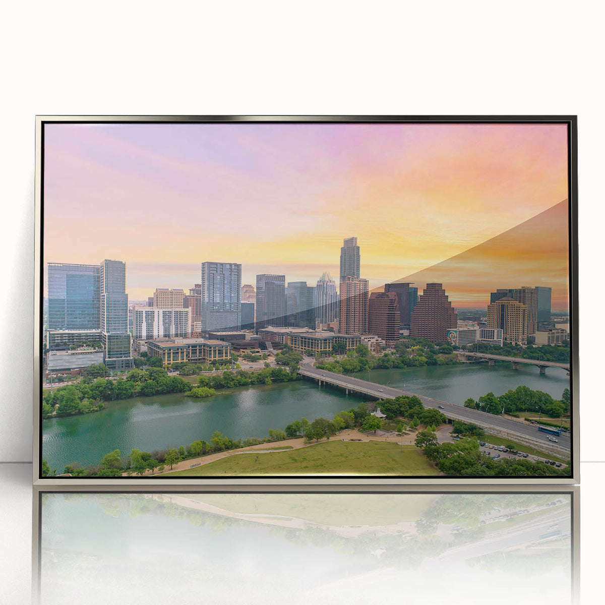 Mid-century modernist art depicting the Austin skyline in muted silver tones on a framed acrylic print.