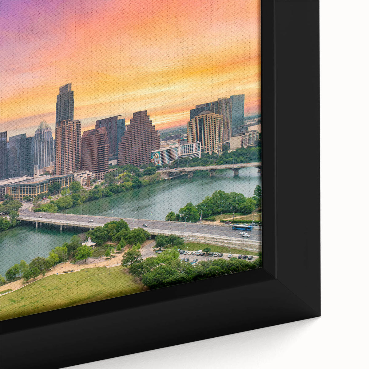 Black wall art featuring a textured Austin, Texas skyline in vibrant colors on a framed canvas, ideal for living room decor.