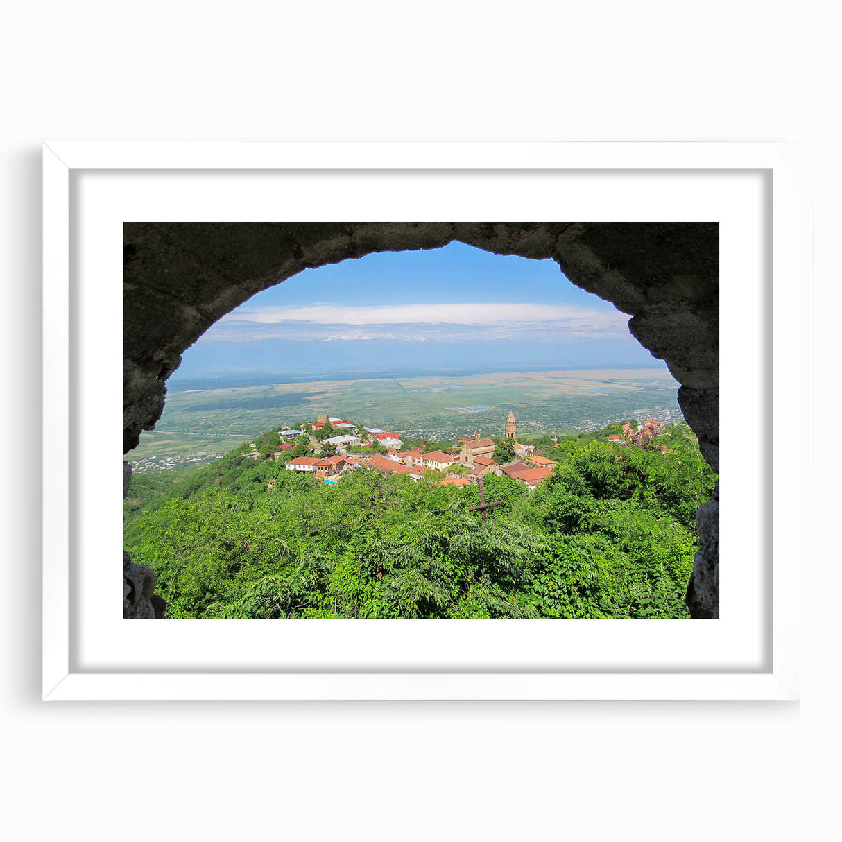 Abstract art print featuring a geometric design in muted earth tones on a white framed canvas.