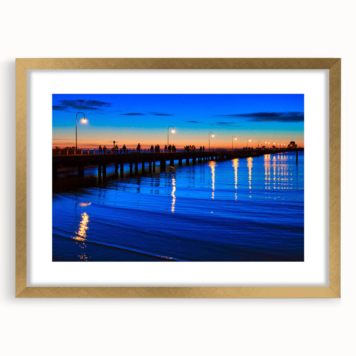 Textured abstract art print of Melbourne scenery in muted gold and brown tones, framed with a gold mat.