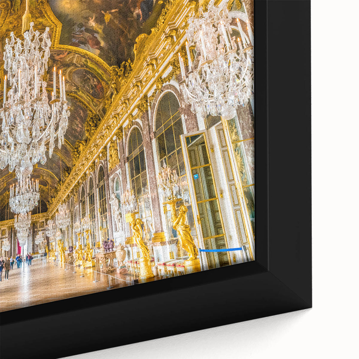 Close-up of a black framed canvas featuring a textured, colorful depiction of the Versailles scenery.