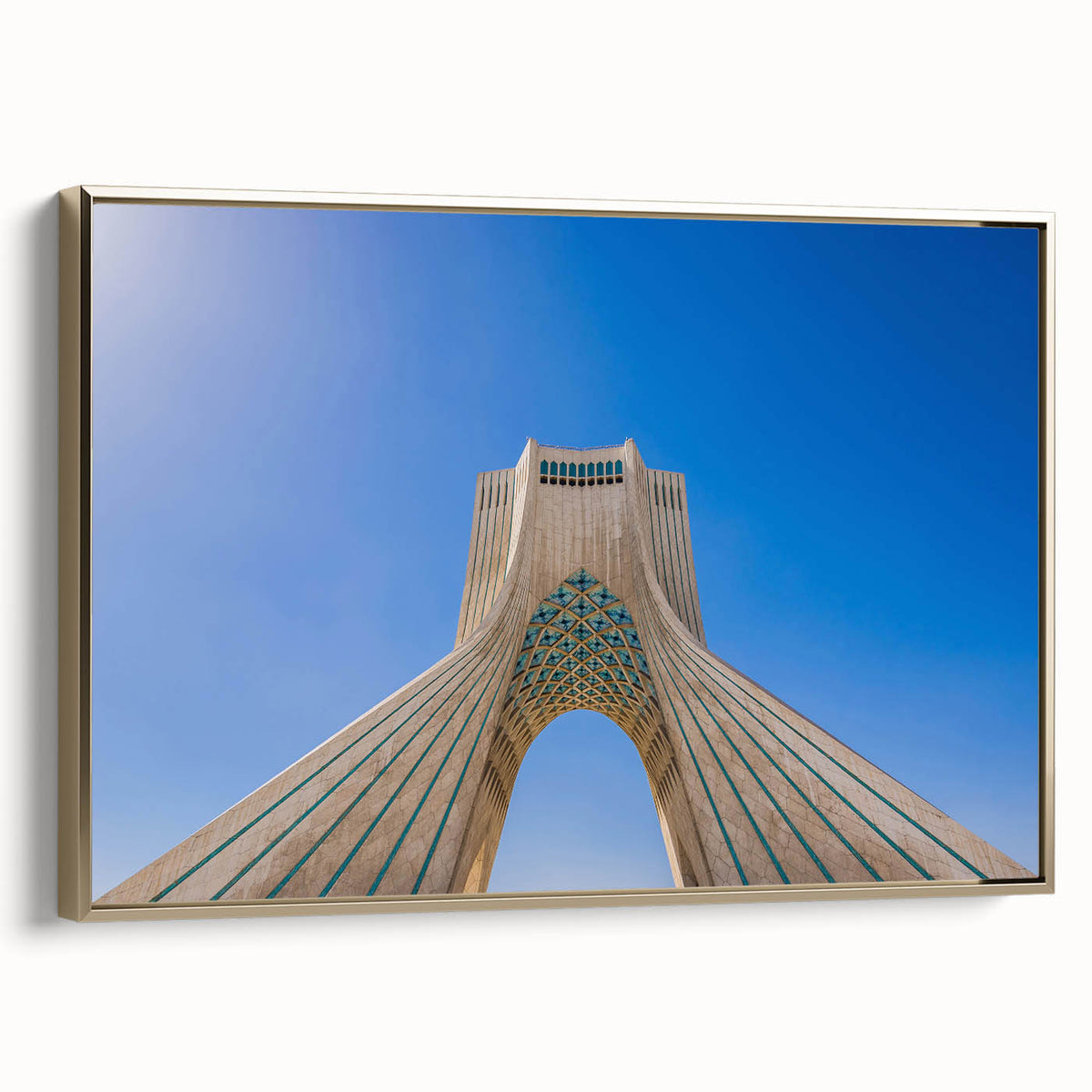 Framed canvas featuring a vintage-style landscape painting of a Middle Eastern scene in muted gold and black.