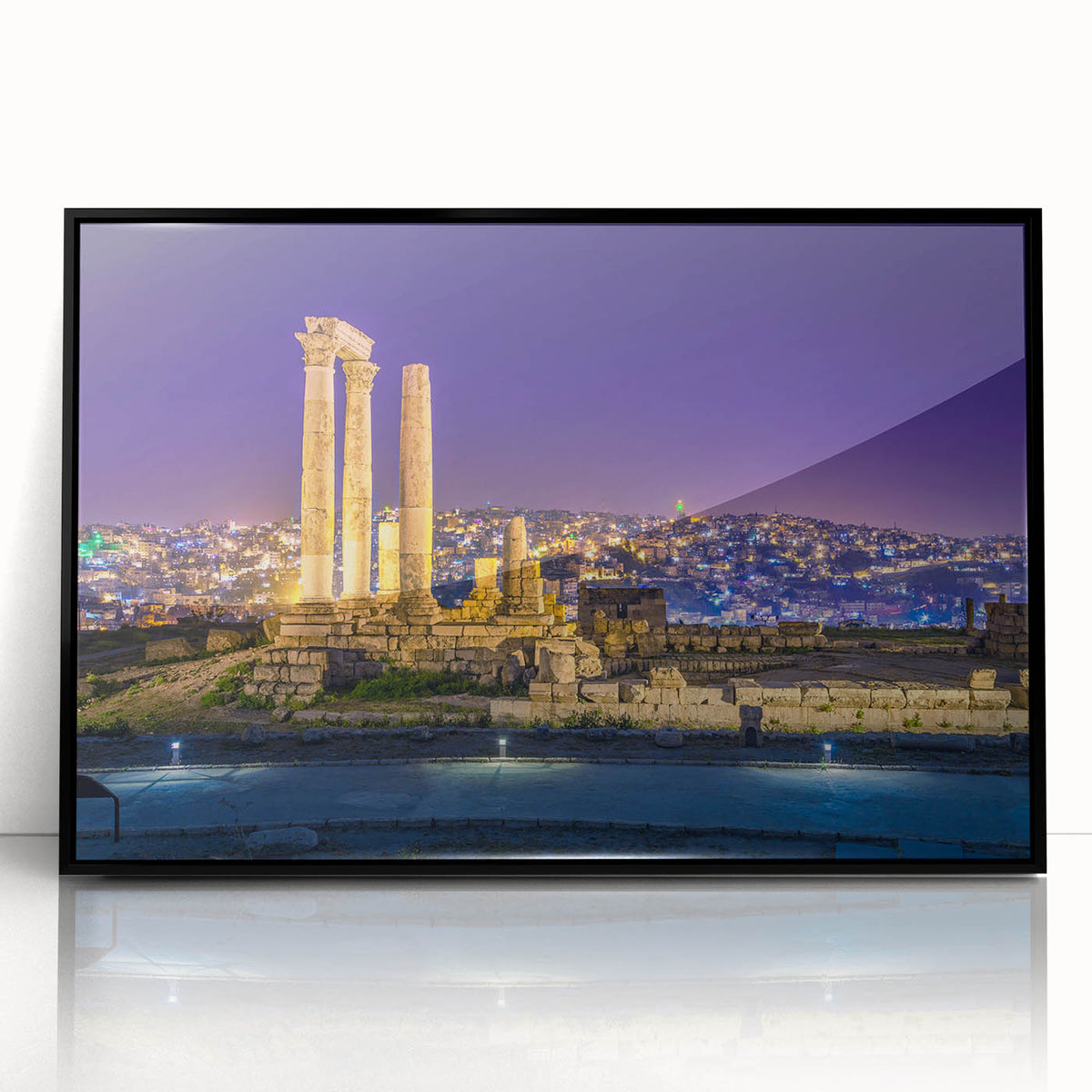 Large abstract wall art depicting Jordanian scenery, in muted earth tones on a black framed acrylic.