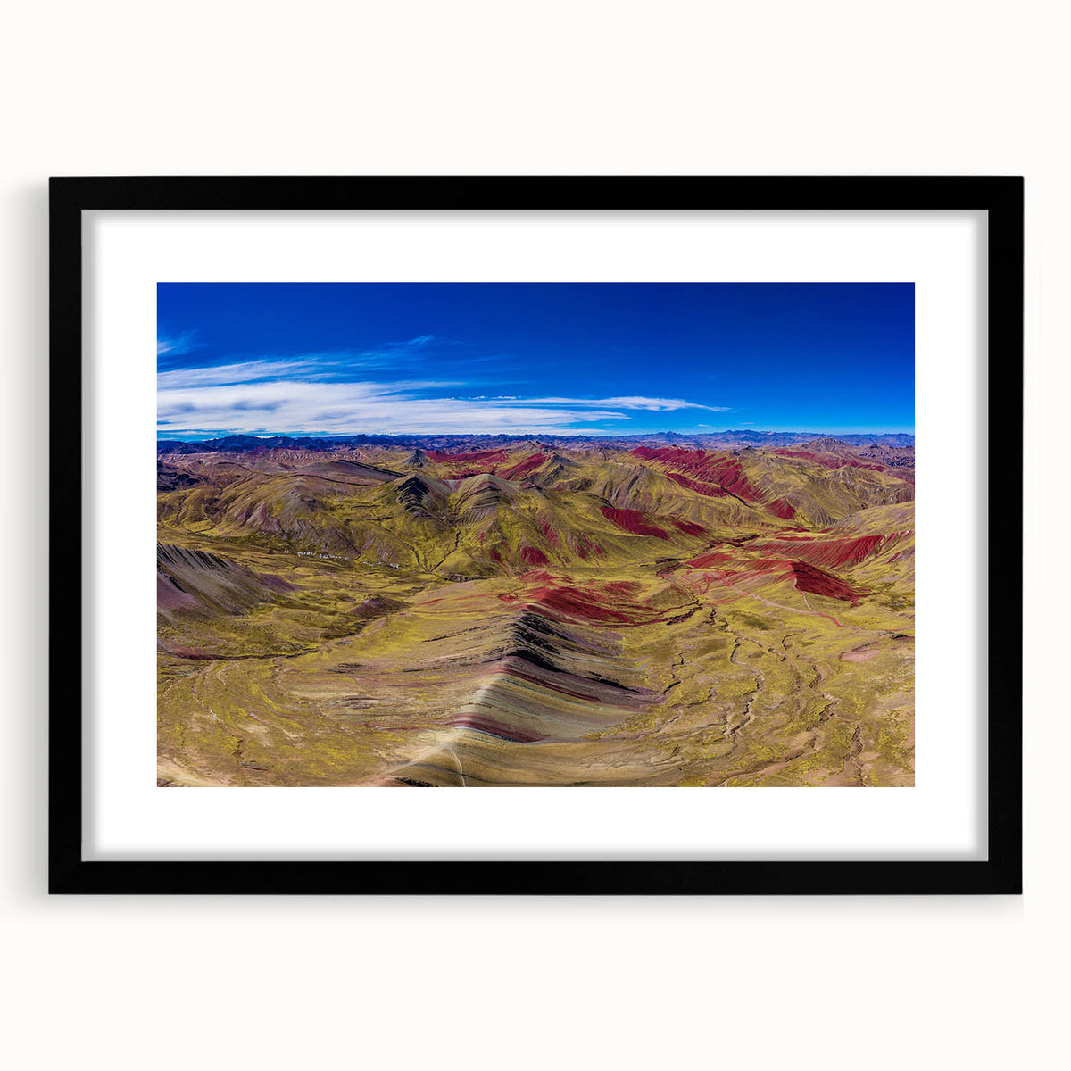 Abstract art print of a colorful South American landscape on textured canvas, framed in black, ideal for living room decor.
