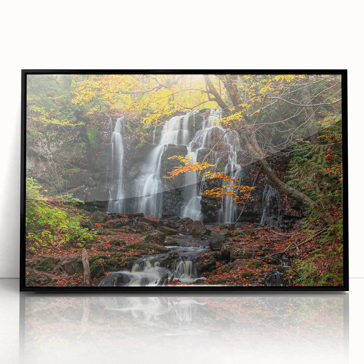 Large abstract wall art depicting Michigan's Upper Peninsula in muted earth tones on a black framed acrylic.