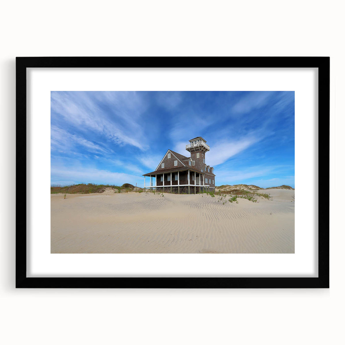 Colorful abstract art print of Outer Banks scenery in vibrant hues on a large framed canvas, ideal for living room decor.