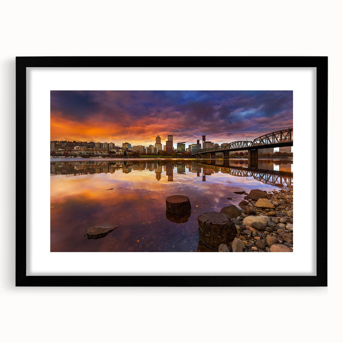Abstract art print of vibrant, textured colors representing Portland's scenery on a large black-framed canvas.
