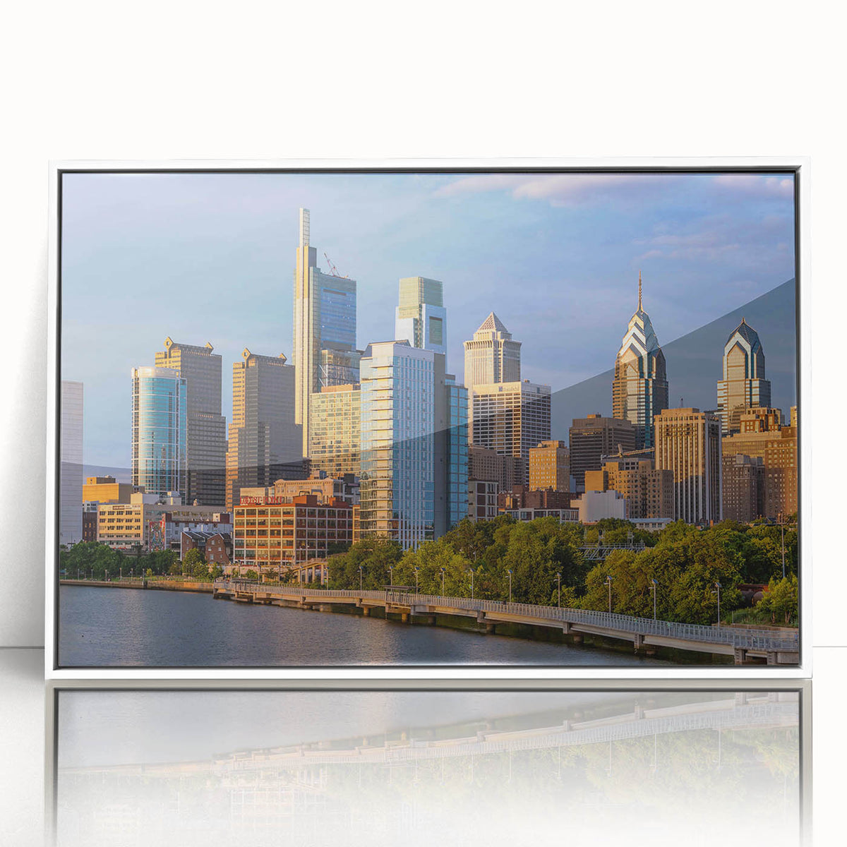 Art deco poster of Philadelphia skyline in muted gray tones on framed acrylic.