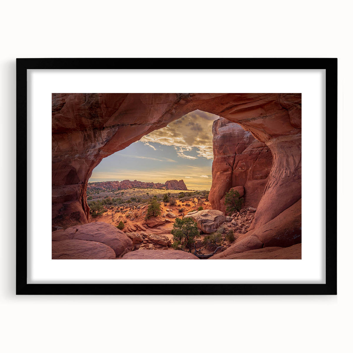 Extra large abstract art print of Utah Arches in vibrant colors on textured canvas, framed in black.