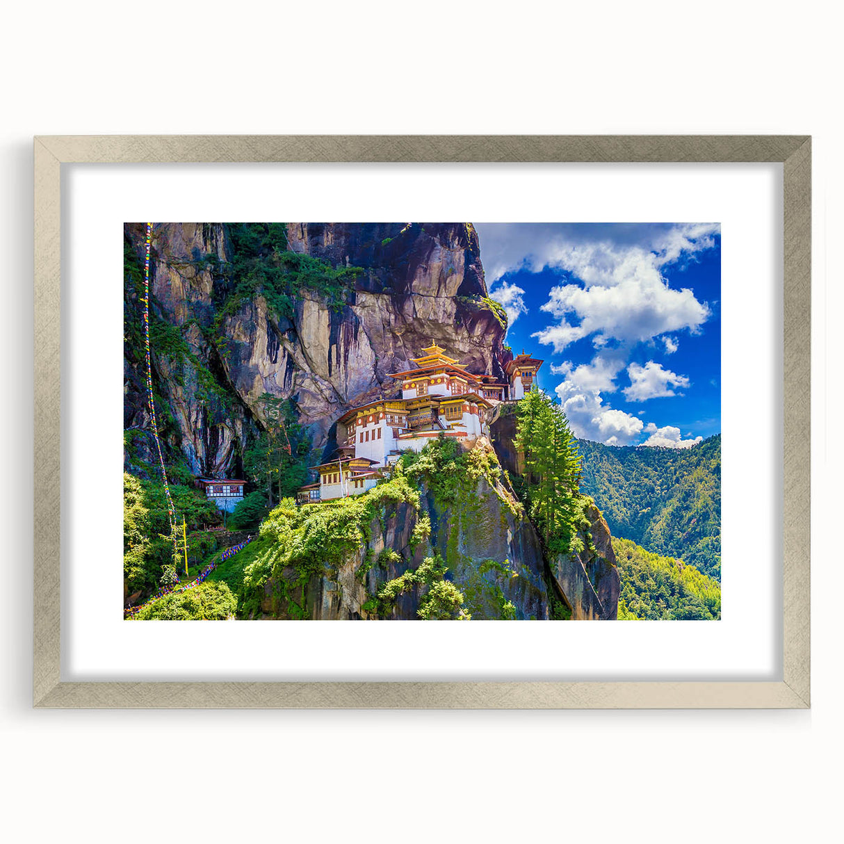 Textured art print depicting an abstract Bhutanese landscape in muted earth tones on a silver-framed mat.