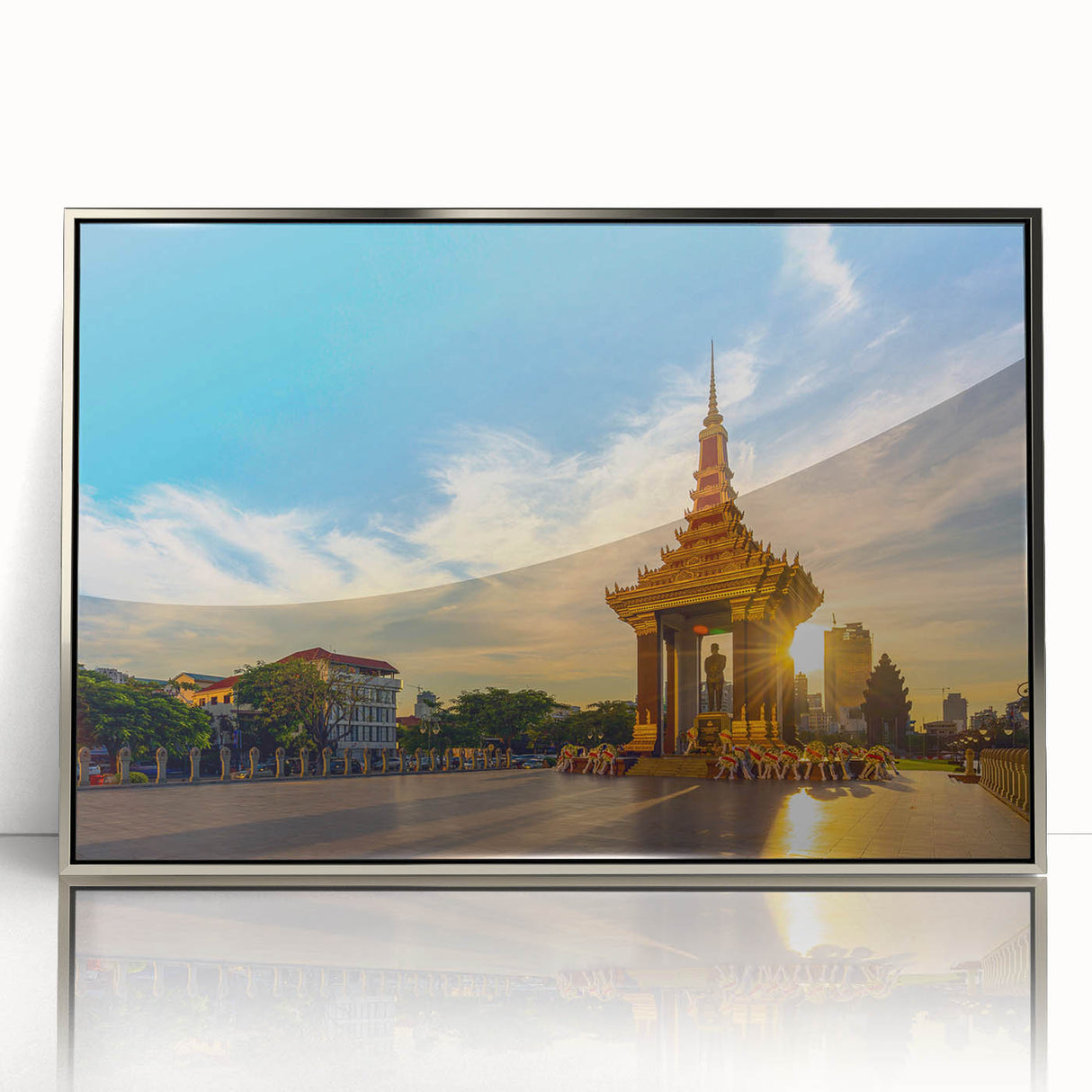 Mid-century modernist art depicting a serene Cambodian landscape in soft earth tones on a silver-framed acrylic print.