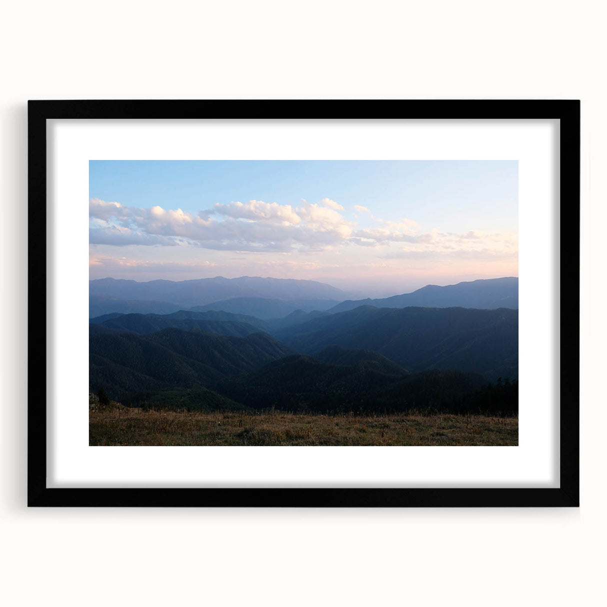 Extra large abstract art print featuring vibrant, colorful textures on a black framed canvas, ideal for living room decor.