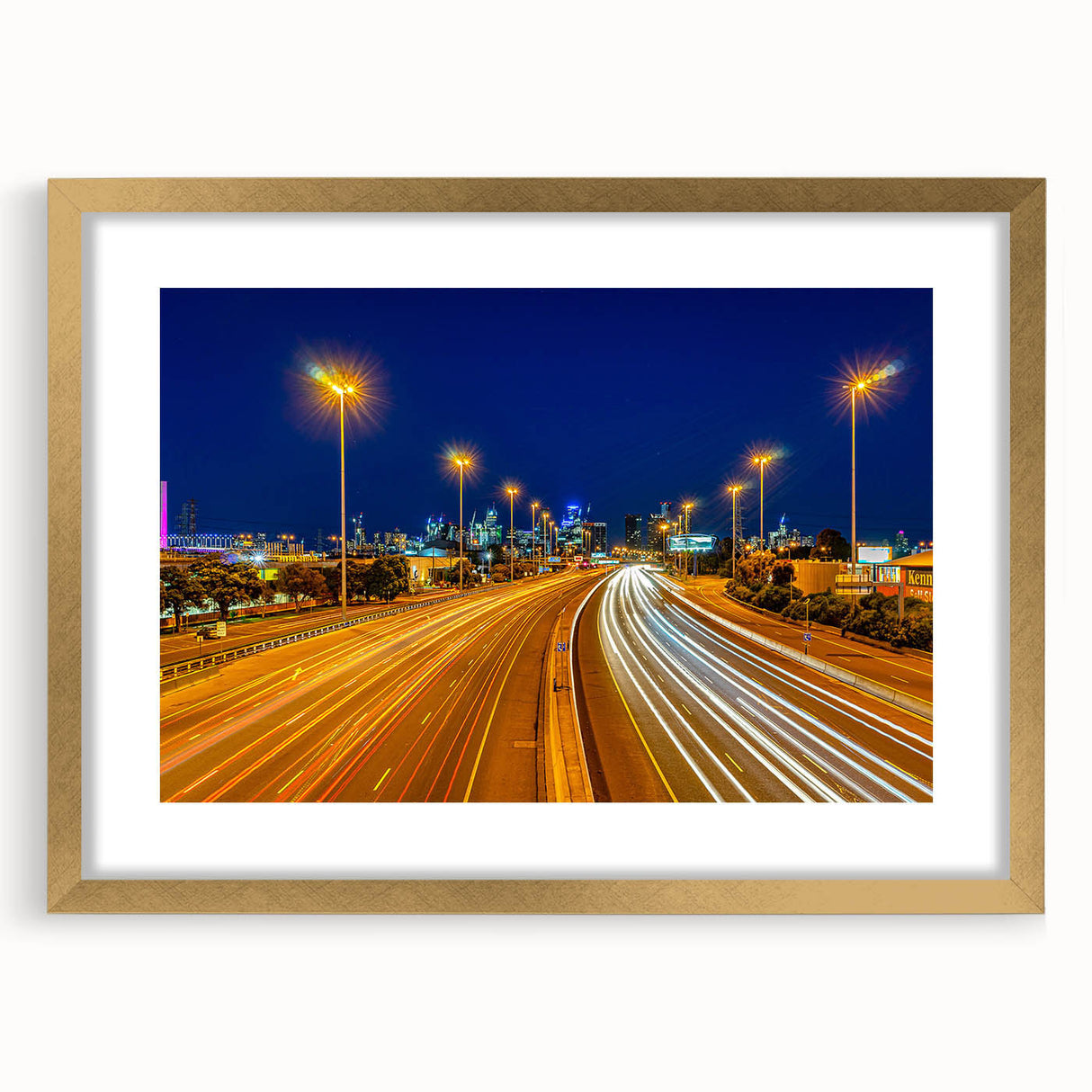 Textured abstract art print depicting Melbourne skyline in gold and black hues on a framed canvas.