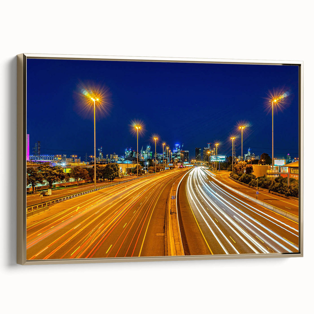 Framed canvas of Melbourne landscape with vintage poster style in colorful and black tones, suited for office decor.