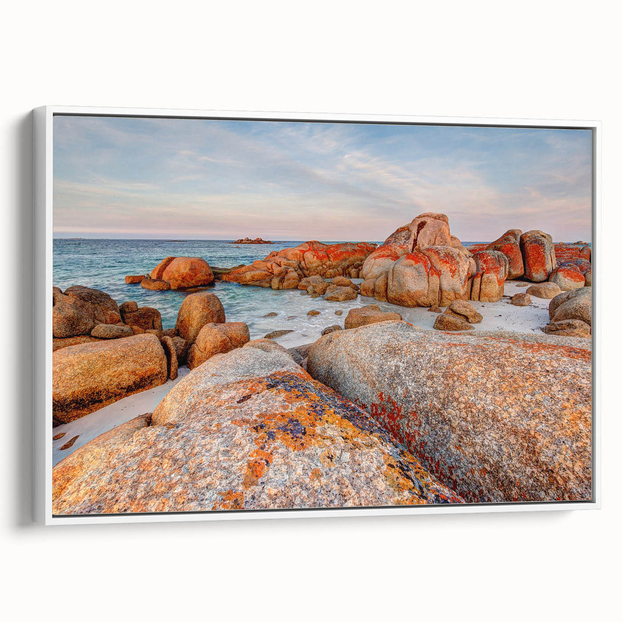 Framed canvas featuring a landscape art painting of Tasmania with vibrant green and blue tones.