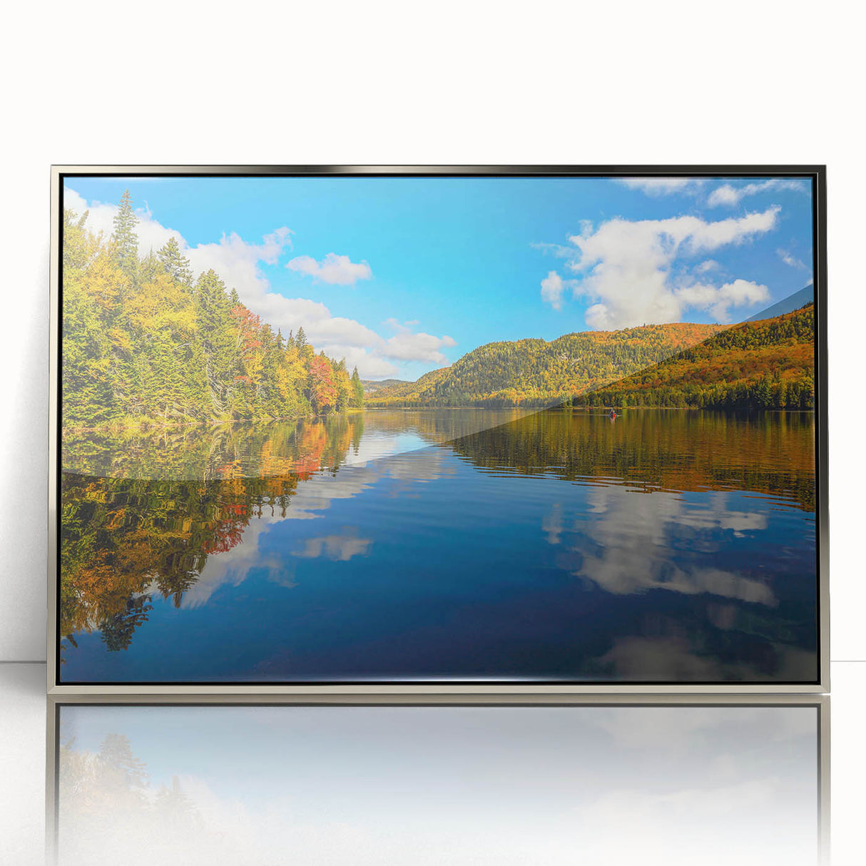 Mid-century modernist art depicting Quebec scenery in muted colors on a silver-framed acrylic print.