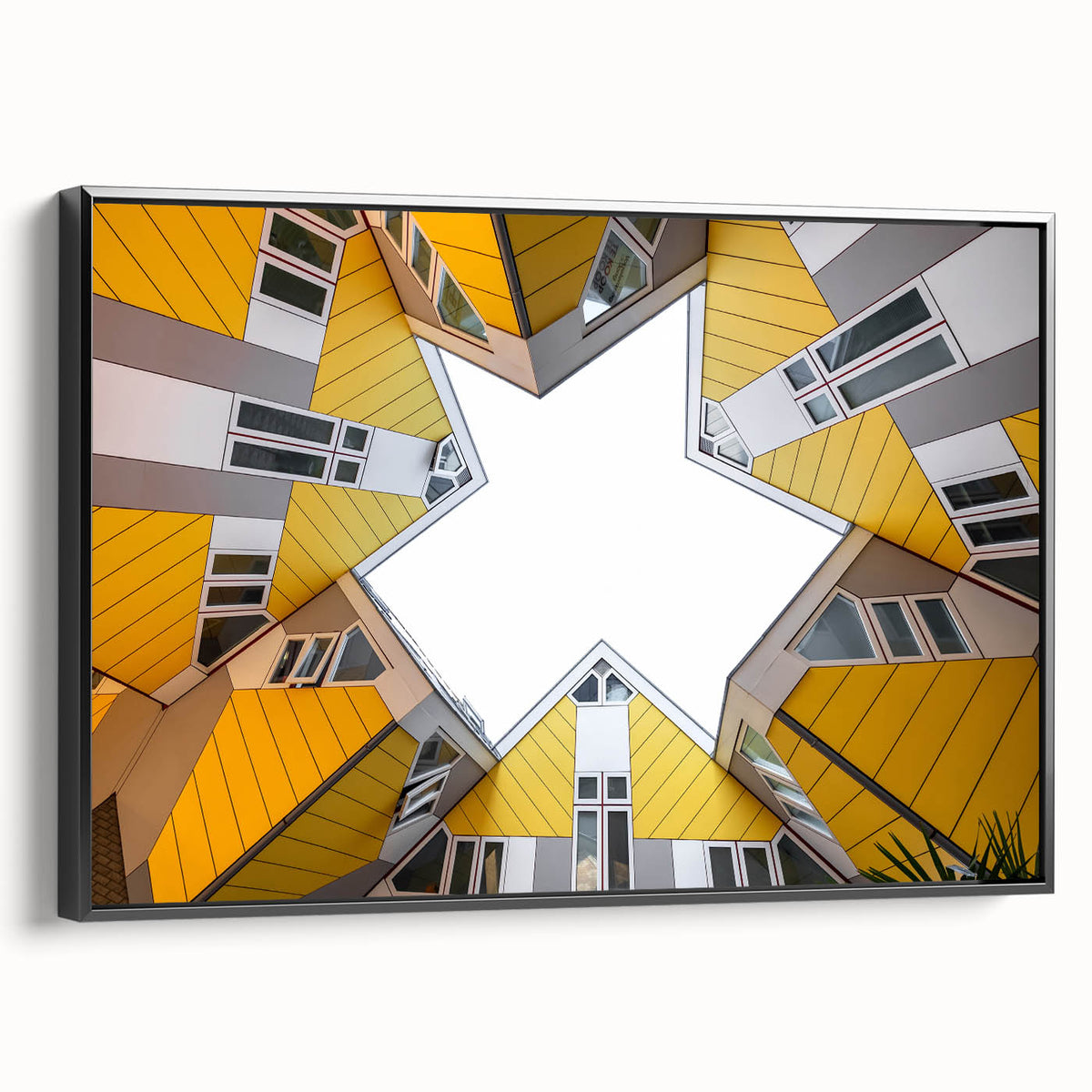 Black and white wall art featuring a vintage poster-style landscape of the Netherlands on framed canvas.