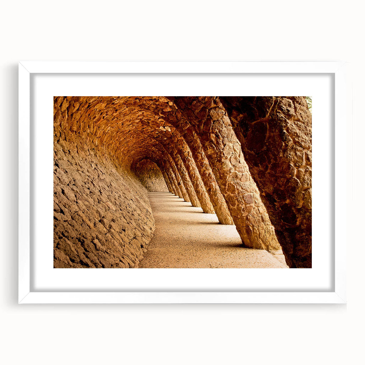 Textured art print of abstract Barcelona scenery in muted earth tones, framed with a white mat, ideal for bedroom art.