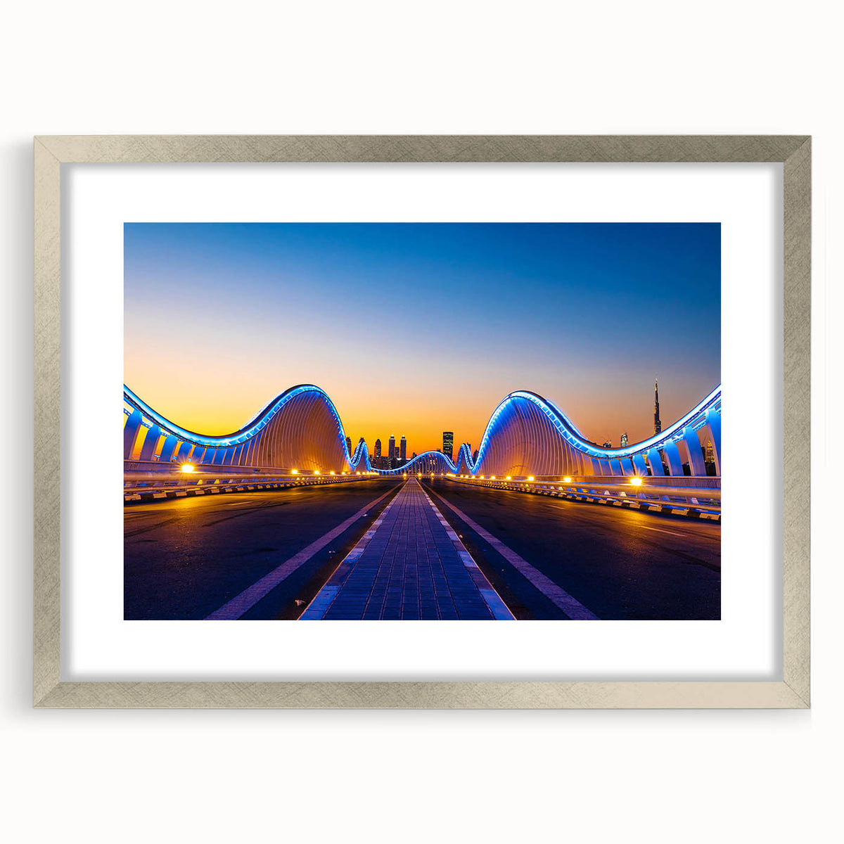 Textured art print depicting an abstract Dubai skyline in muted silver and gray tones on a framed canvas.