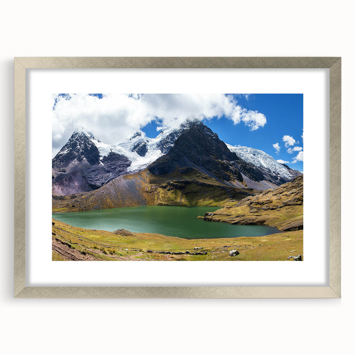 Textured art print of an abstract Peruvian landscape in earthy tones, framed in silver, ideal for bedroom decor.