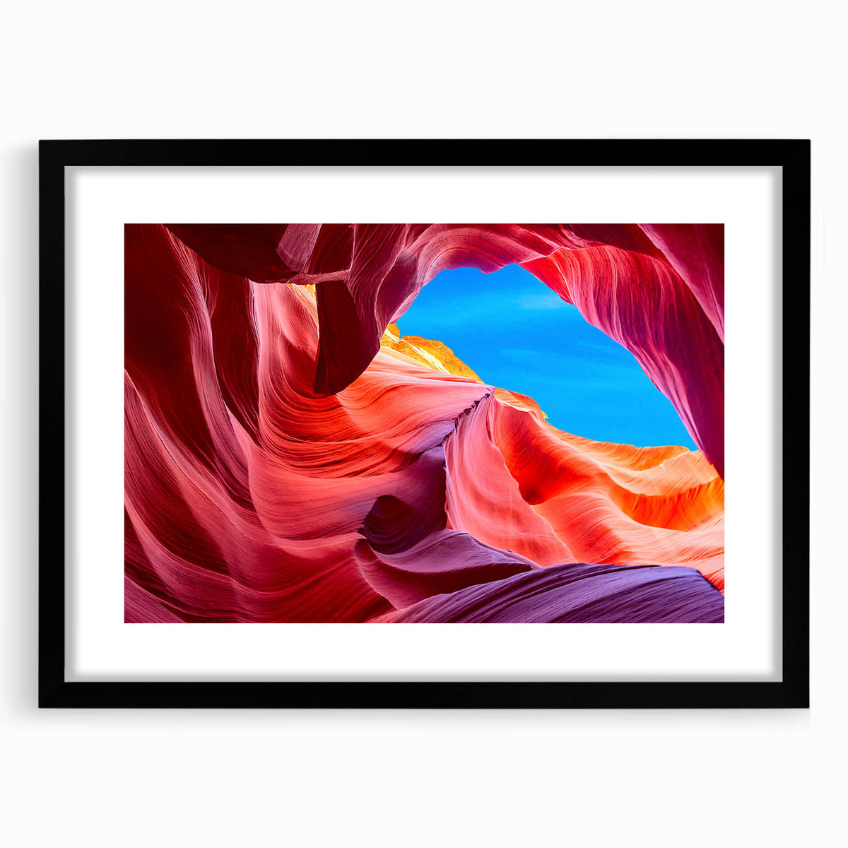 Extra large, textured abstract art print of colorful Arizona Antelope Canyon on a black framed canvas.