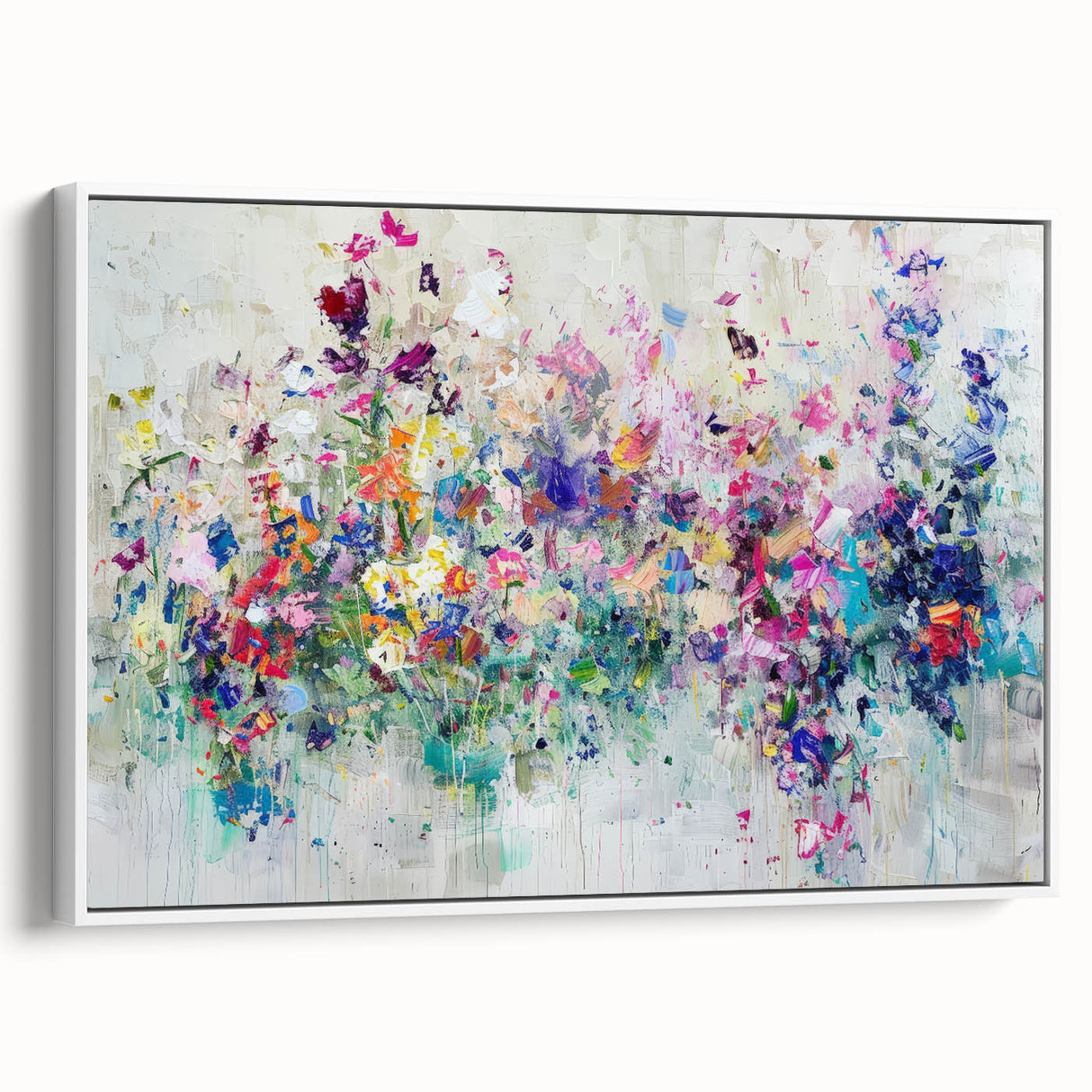 Framed abstract canvas art featuring vibrant splatters in various colors against a white background, showcasing a modern design perfect for contemporary decor.