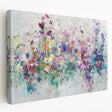 Abstract splatter art canvas featuring vibrant colors and dynamic patterns, showcasing a side view of the stretched design ideal for modern home decor.