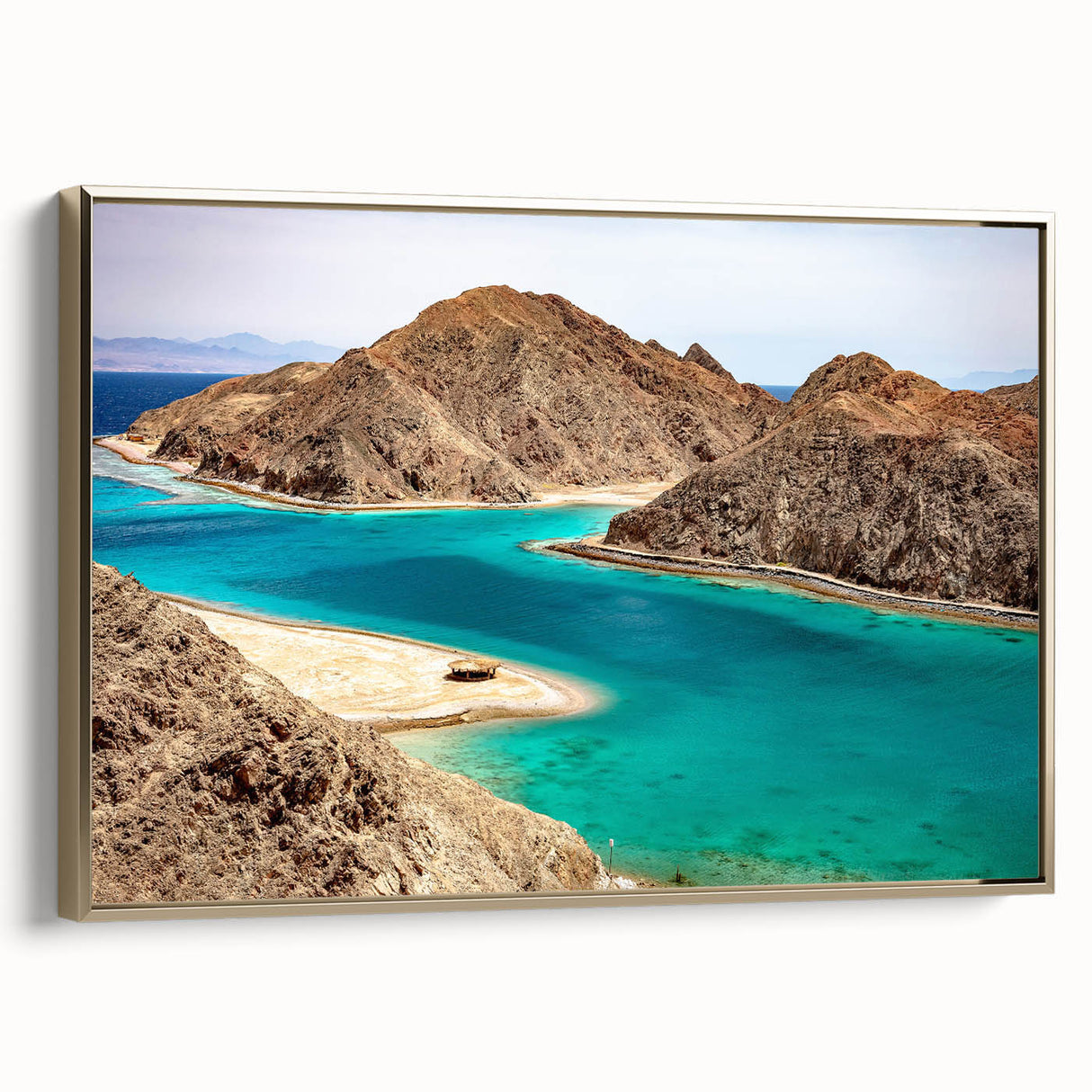 Framed canvas featuring a vintage-style landscape painting of an Egyptian scene, using a color palette of gold and black.