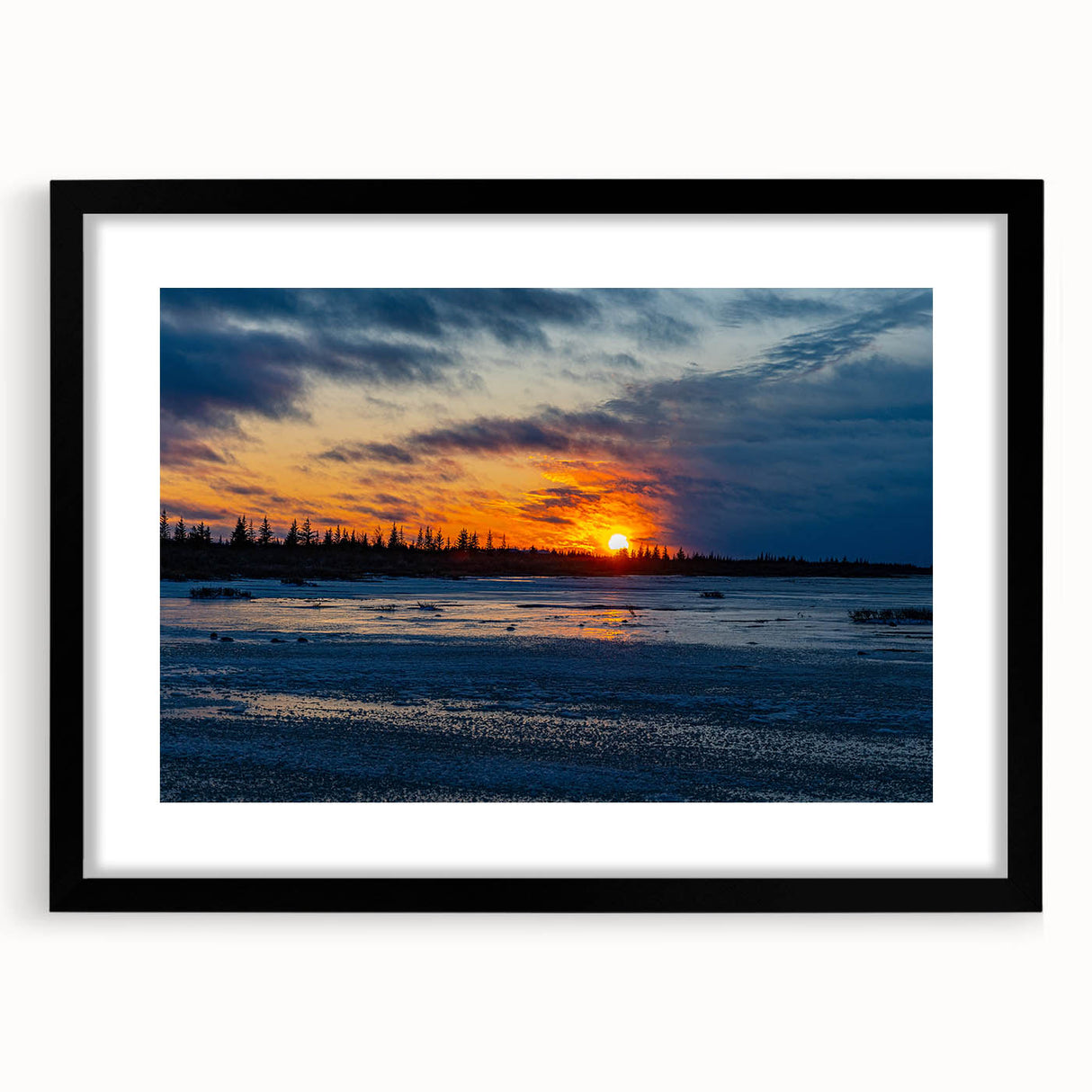 Abstract art print of a vibrant, textured Canadian landscape in a black frame, ideal for living room decor.