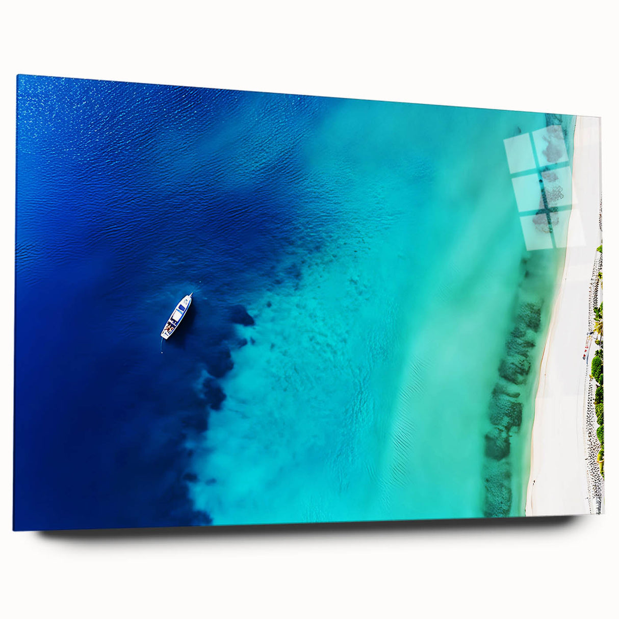 Large abstract wall art of a Caribbean beach scene on acrylic glass, featuring vibrant ocean blues and sandy tones.