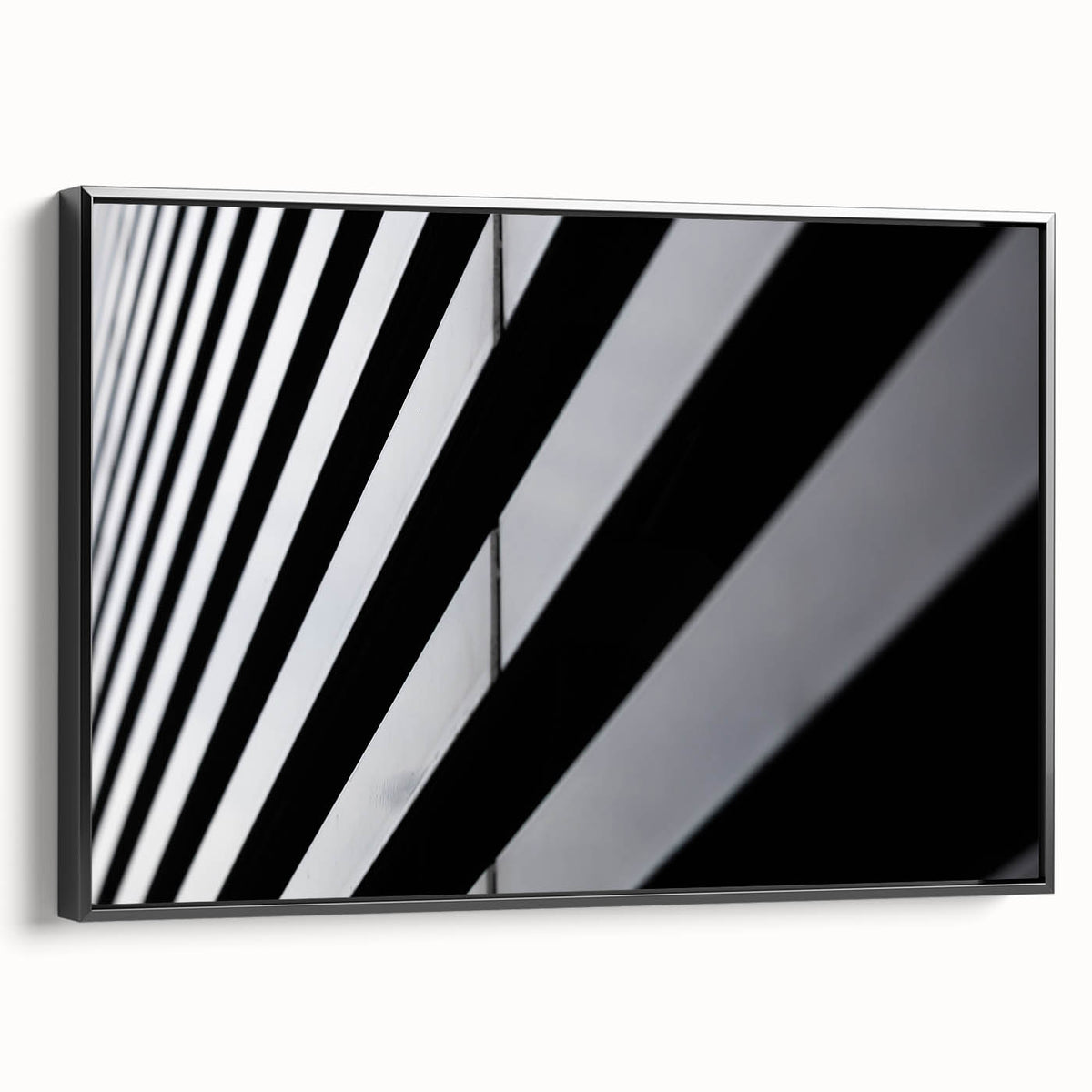 Black and white framed canvas of Amsterdam landscape with vintage poster art style, suitable for bedroom decor.