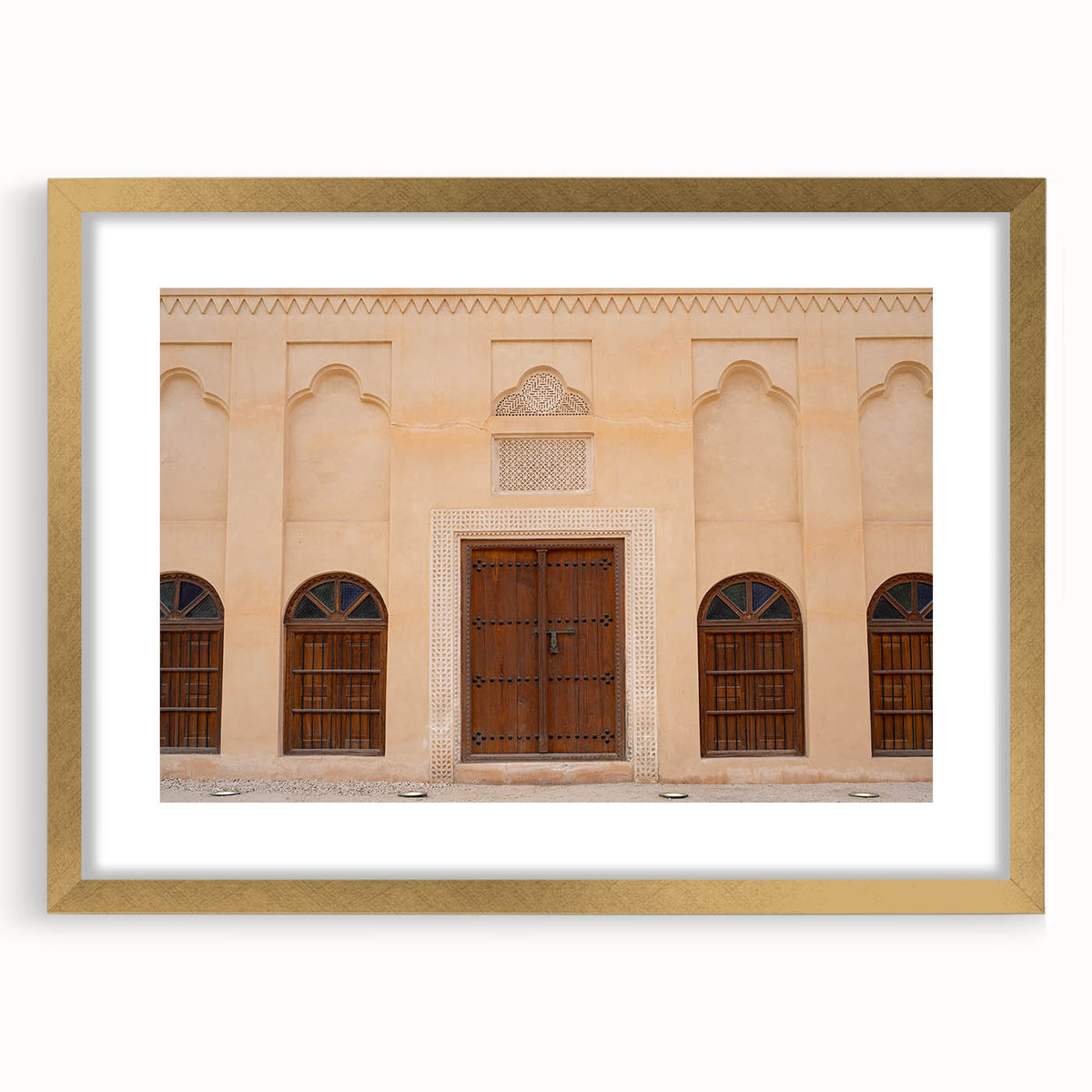 Extra large abstract art print of Dubai skyline in textured gold tones on a framed canvas, ideal for living room decor.