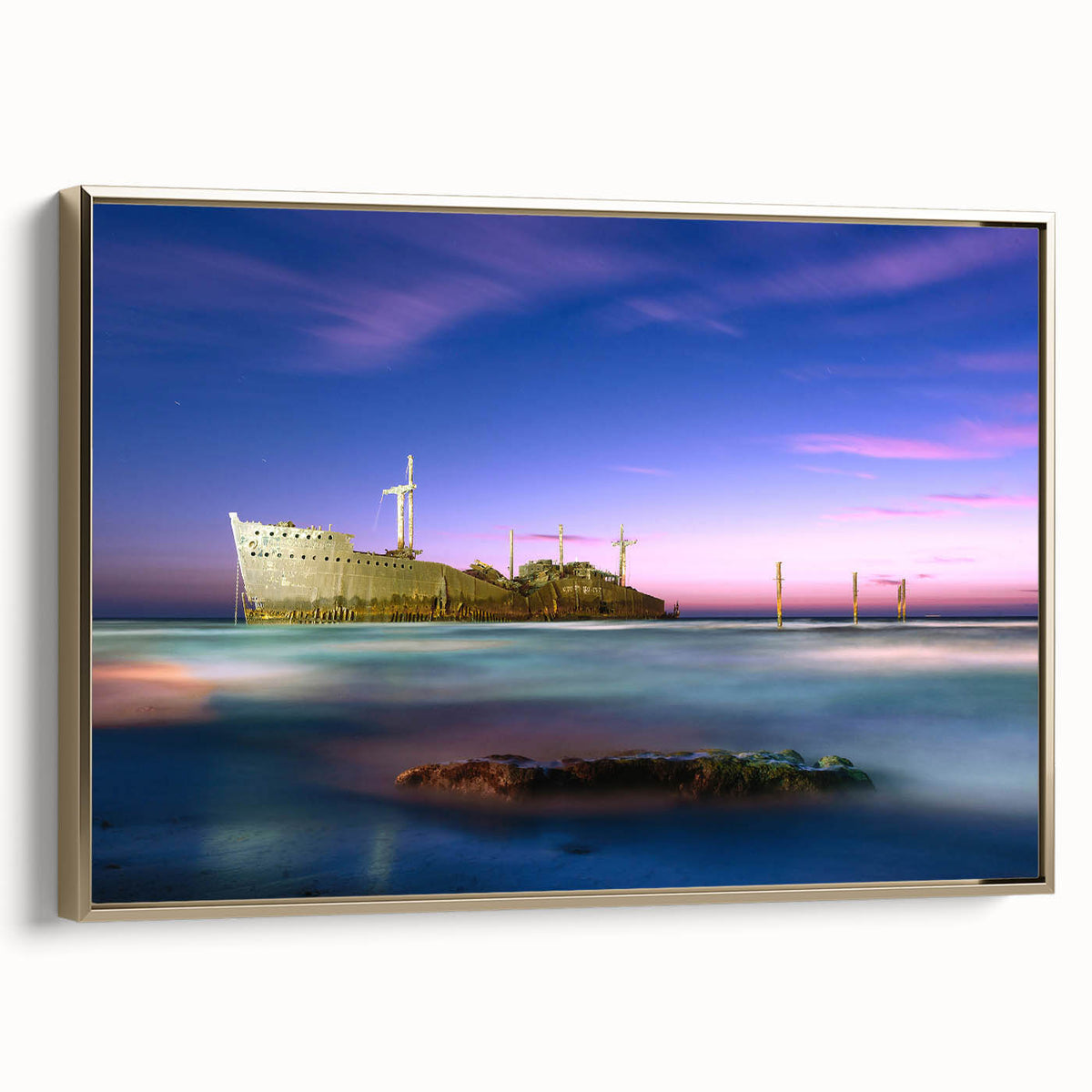 Framed canvas depicting a vintage-style landscape of Middle Eastern scenery, with gold and black tones.