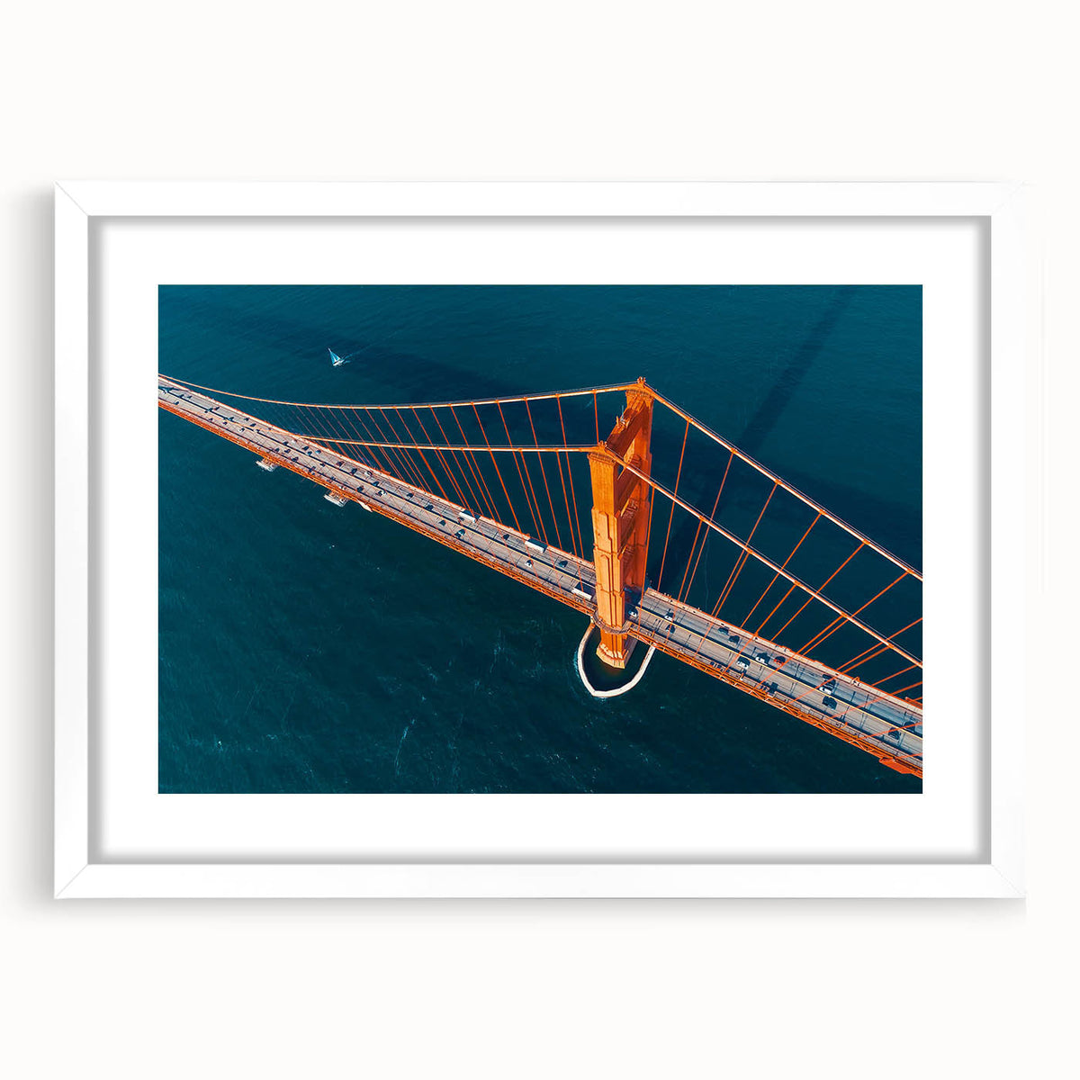 Abstract art print of San Francisco skyline in muted blue and gray tones on a framed white mat.