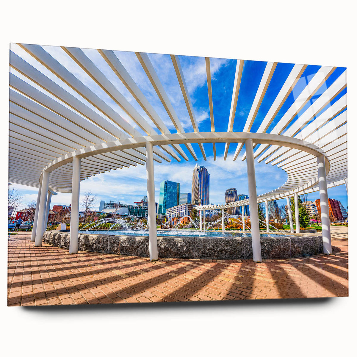 Acrylic print of a large abstract depiction of the Charlotte skyline in muted blue and gray tones.