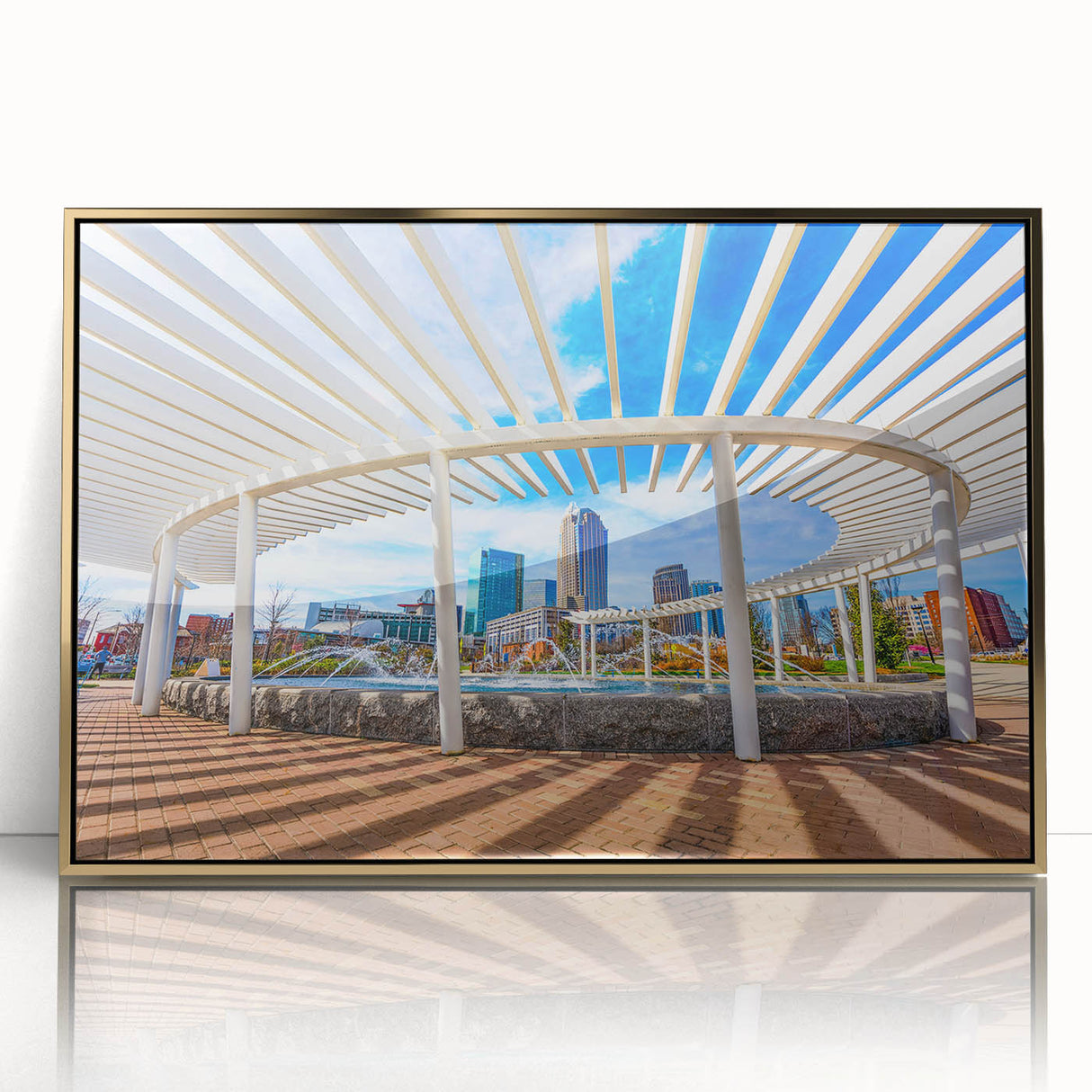 Acrylic print of Charlotte skyline in muted gold and blue tones, framed, fitting for mid-century modern nursery decor.