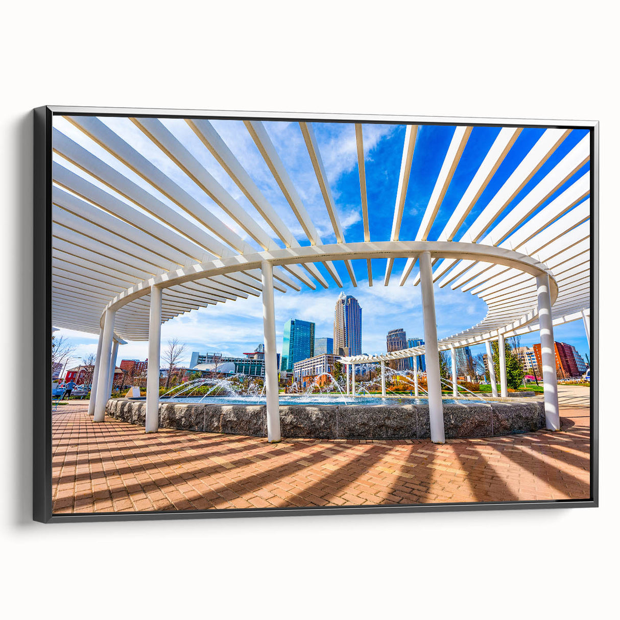 Black and white wall art of Charlotte, North Carolina skyline on framed canvas, suitable for bedroom decor.