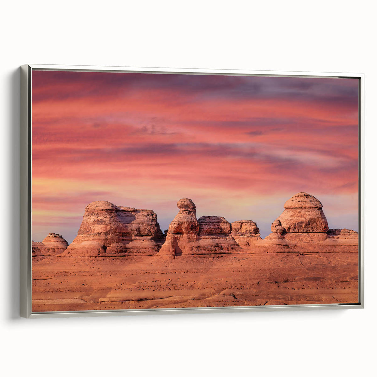 Framed canvas landscape art painting of Utah Arches in vibrant red and orange tones, ideal for modern living room decor.