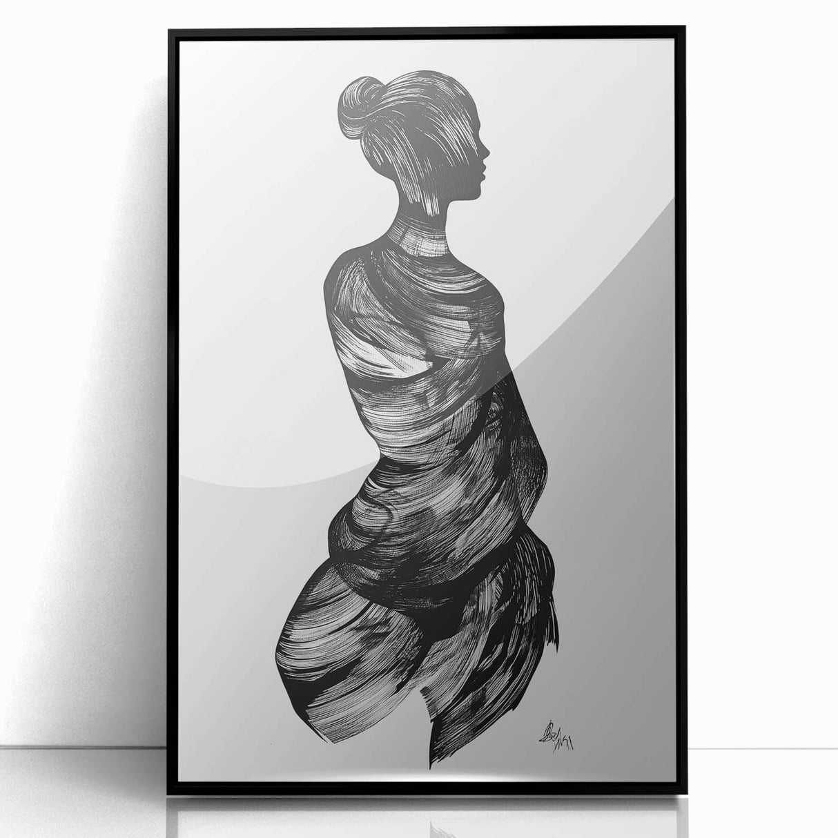 Framed abstract figurative artwork in black acrylic, showcasing modern design elements and a sleek front view, perfect for contemporary home decor.