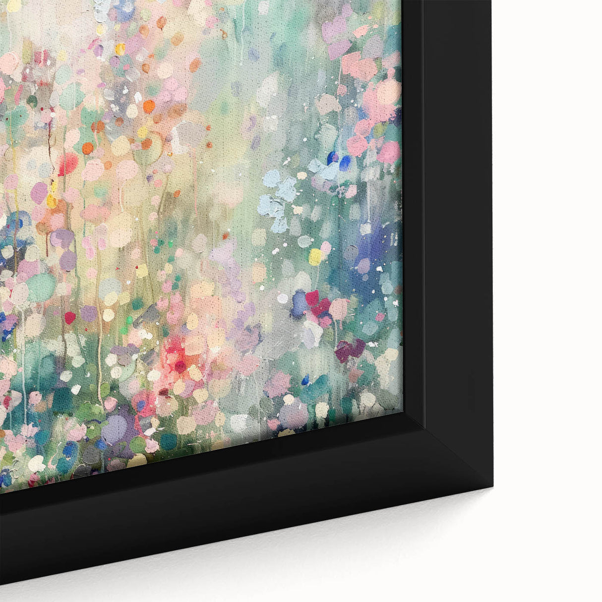 Framed abstract art canvas featuring vibrant splatter designs in shades of blue, yellow, and red, showcasing a modern aesthetic ideal for contemporary home decor.