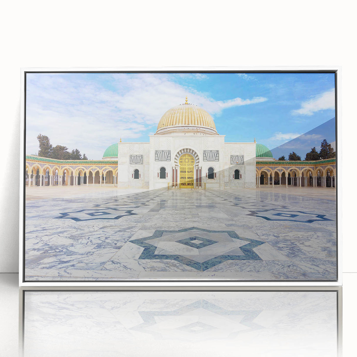 Acrylic print of a Tunisian landscape in muted earth tones, framed in white, suitable for modern art wall decor.