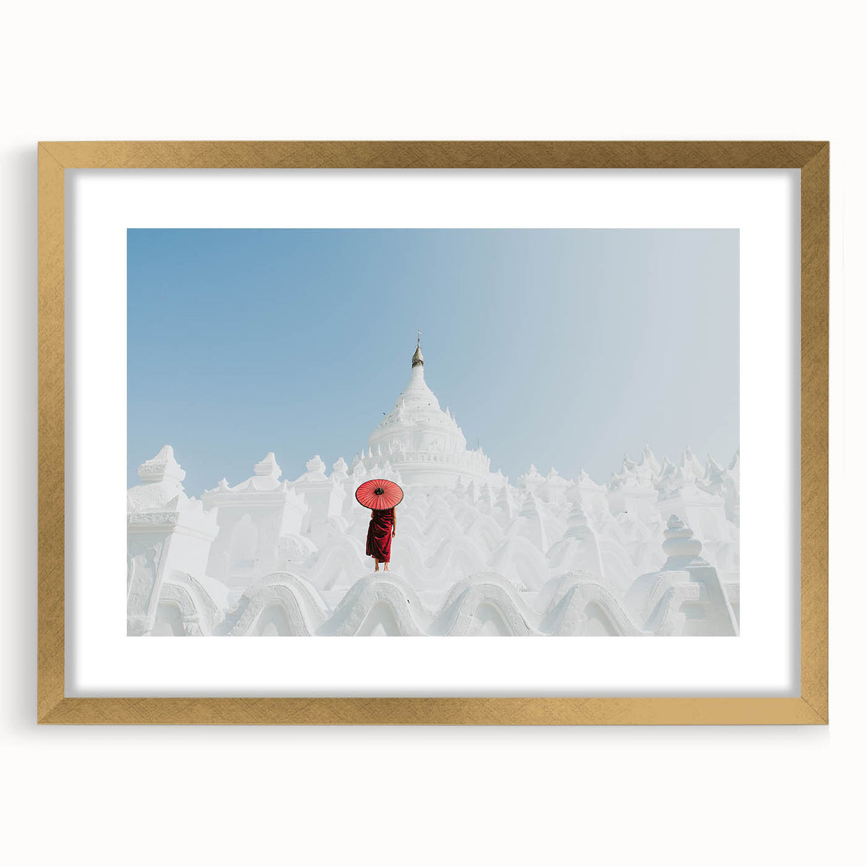 Extra large abstract art print depicting a textured Myanmar scenery in muted gold tones, framed with a mat.