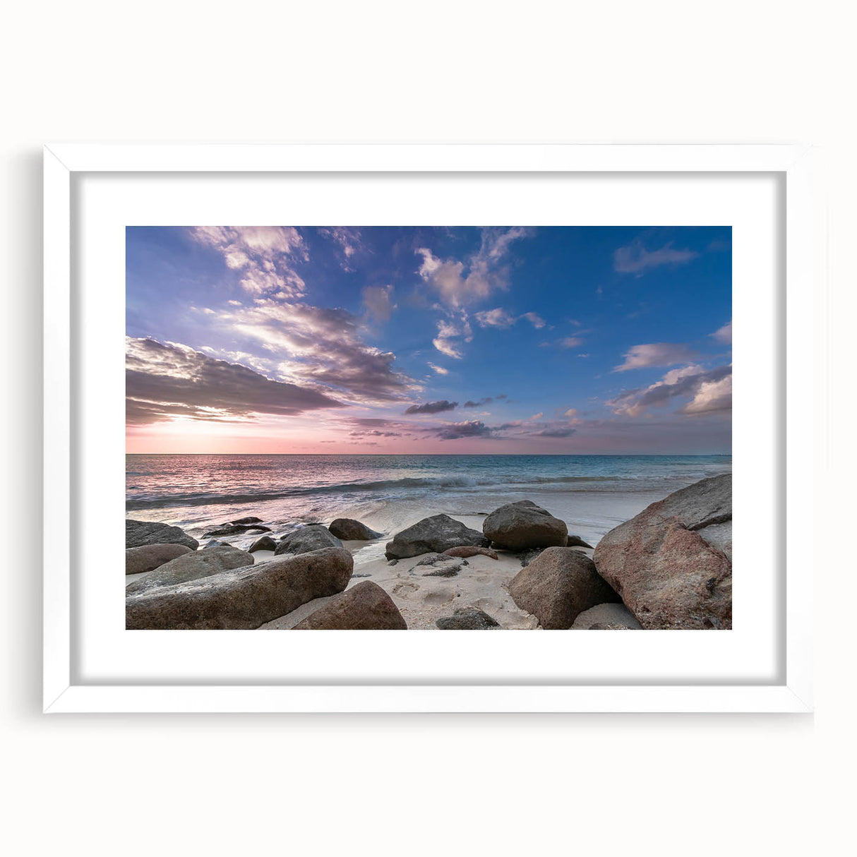 Textured abstract art print depicting Caribbean scenery in blue and white tones on a framed mat, ideal for bedroom decor.