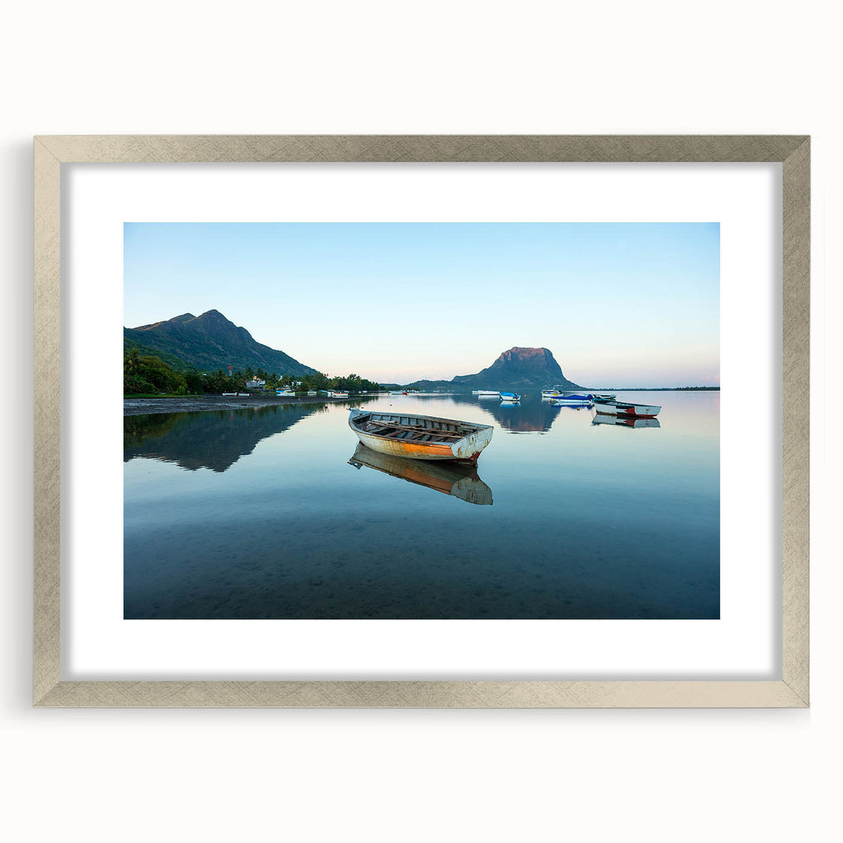 Extra large wall art depicting an abstract Caribbean scenery in textured blues and greens, framed in silver.