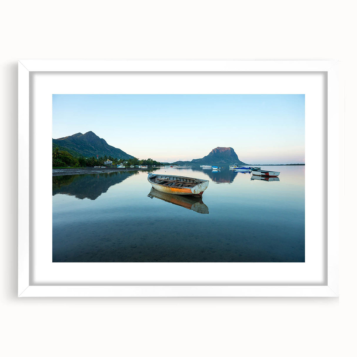 Textured abstract art print depicting a Caribbean scenery in muted blue and green, framed with a white mat.